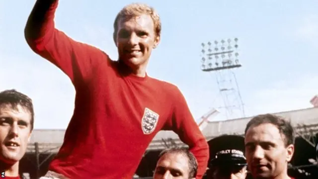 England captain Bobby Moore holds aloft the Jules Rimet trophy at the 1966 World Cup