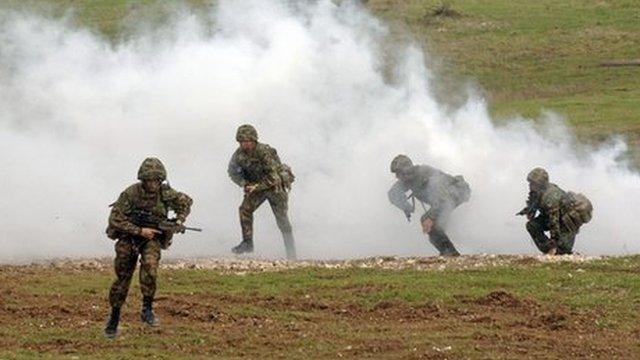 Soldiers from the British Army take part in a training exercise on Salisbury Plain, Wiltshire.