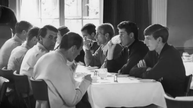 Geoff Hurst spots the camera as the England team take breakfast ahead of the final