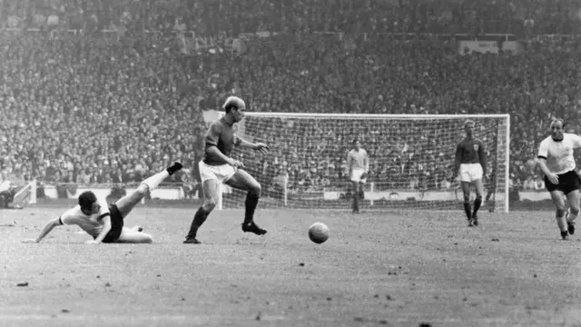 Bobby Charlton commands England's midfield during the 1966 World Cup final