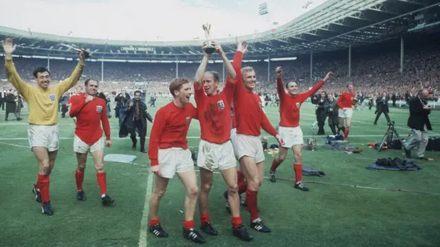 Bobby Charlton, Alan Ball and Bobby Moore celebrate winning the 1966 World Cup