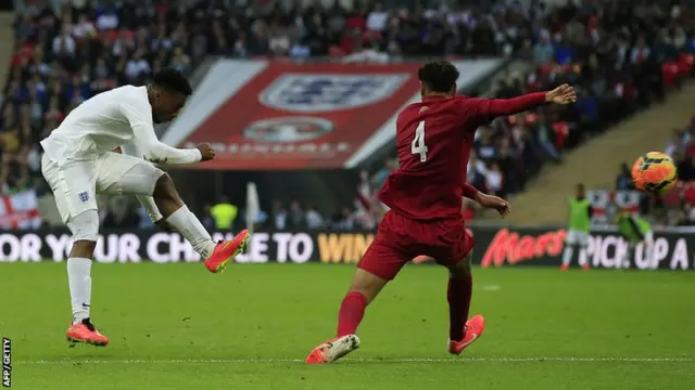 Daniel Sturridge scores England's first goal against Peru at Wembley