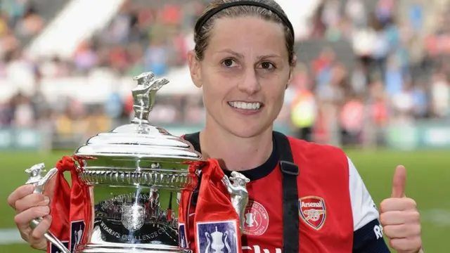 Arsenal Ladies skipper Kelly Smith with the 2014 FA Women's Cup trophy