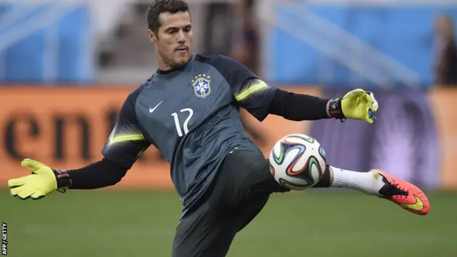 Julio Cesar warms up ahead of Brazil v Croatia