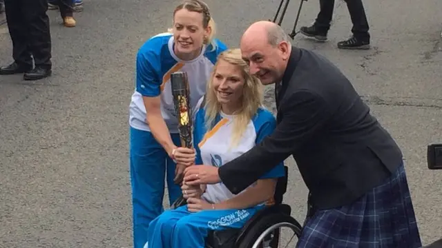 Scottish 400m hurdling star Eilidh Child (left), Team Scotland's Samantha Kinghorn and Commonwealth Games Scotland's Michael Cavanagh were pictured with the baton in Coldstream.