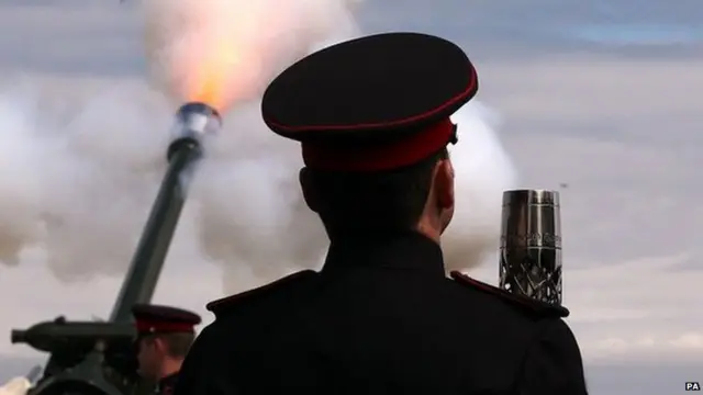 The Queen"s Baton arrives at Edinburgh Castle for a 21 gun salute