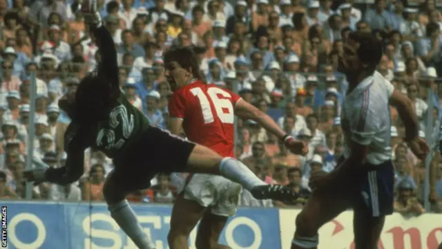 Bryan Robson scores