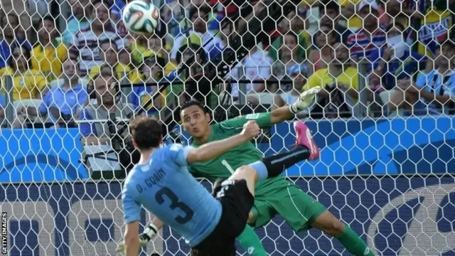 Diego Godin shoots