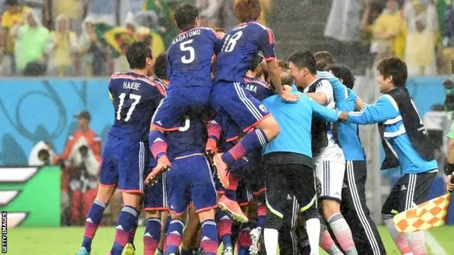 Japan players celebrate