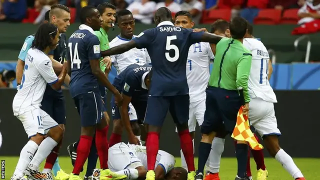 France and Honduras players argue over a challenge on Wilson Palacios