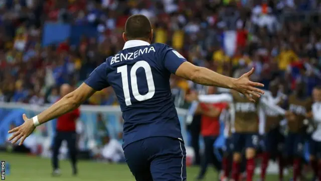 Karim Benzema celebrates after scoring his side's third goal of the evening against Honduras