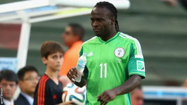 Victor Moses of Nigeria walks to the bench