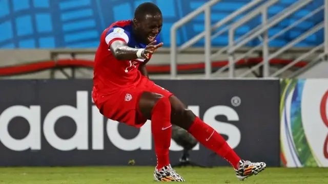 Jozy Altidore of the United States pulls up injured