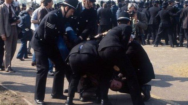 Striking miners clash with police