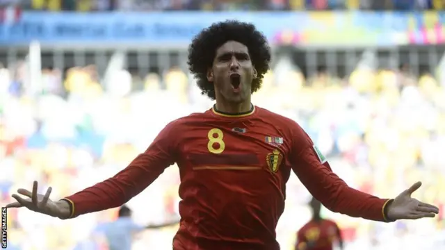 Belgium's midfielder Marouane Fellaini celebrates