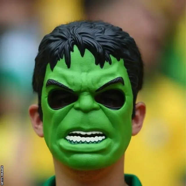 Brazil fan wearing Incredible Hulk mask