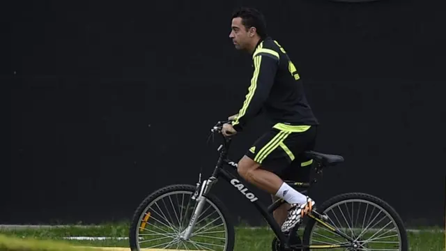 Xavi on his bike during training for Spain v Chile