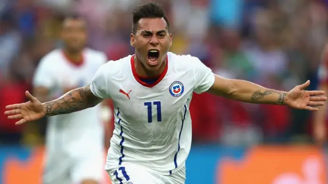 Eduardo Vargas of Chile gives his team a 1-0 lead over Spain