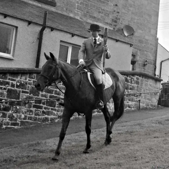 Baton being carried on horseback by Dale Irving.