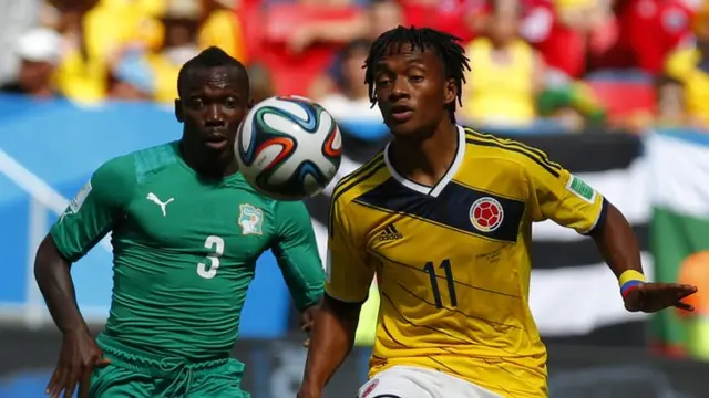 Colombia star Juan Cuadrado strips Ivory Coast's Arthur Boka for pace