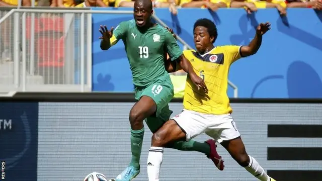 Yaya Toure and Carlos Sanchez