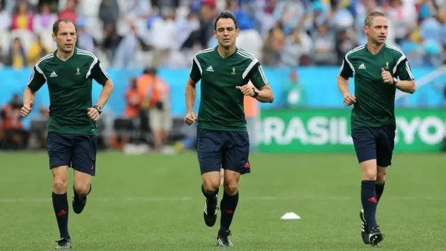 Referee Carlos Velasco Carballo with his assistans for England v Uruguay