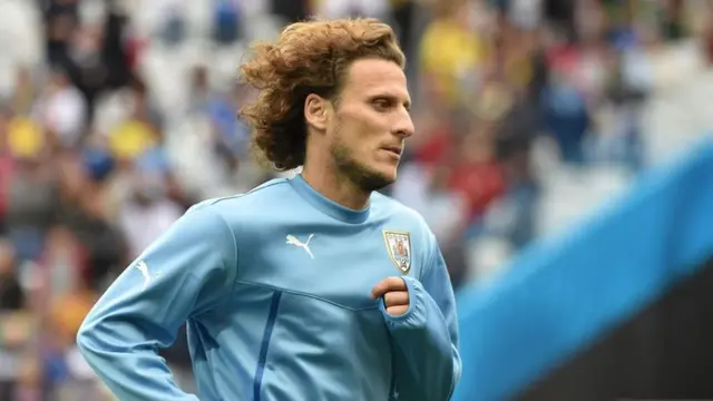 Diego Forlan warms up for Uruguay