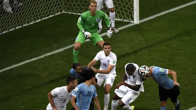 England players scramble to defend their own box