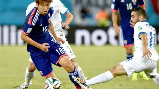 Yuya Osako of Japan against Greece