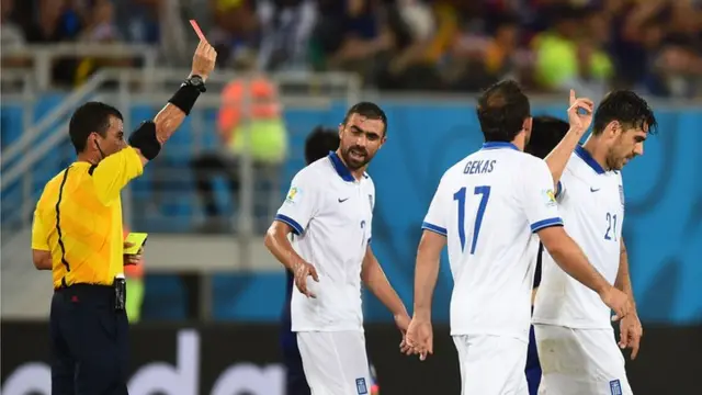 Konstantinos Katsouranis is red carded in the match against Japan