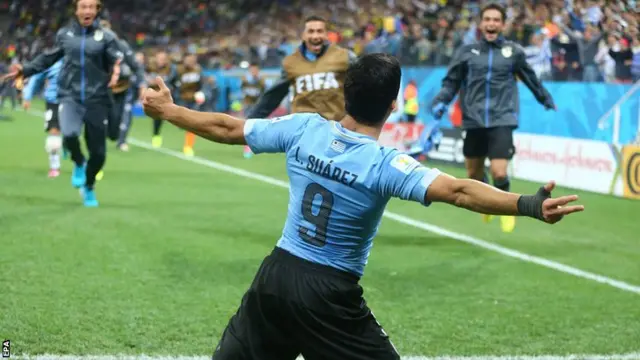 Luis Suarez celebrates