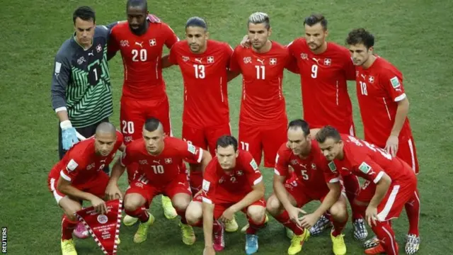 Switzerland players pose before the 2014 World Cup Group E game