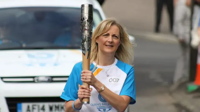 Rhona O'Neill carries the baton in New Cumnock