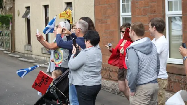 Spectators gathering in New Cumnock, East Ayrshire, for the Queen's baton.