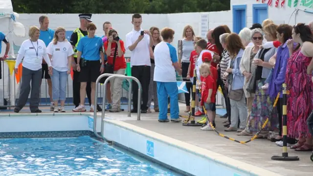 Baton at open-air pool in New Cumnock