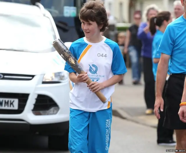 Gillian Johnstone carries the baton in Mauchline