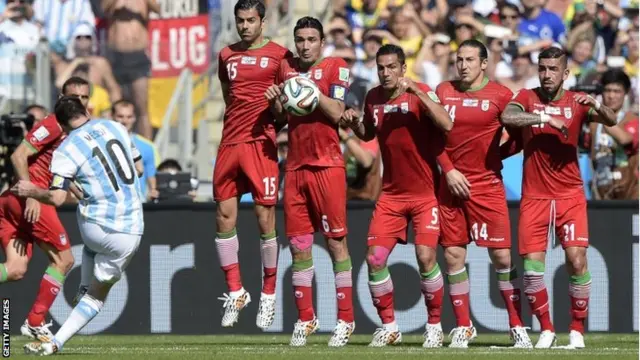 Argentina's forward and captain Lionel Messi takes a free kick