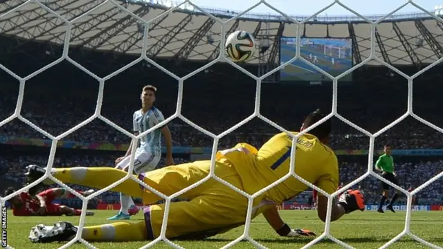 Argentina's goalkeeper Sergio Romero makes a save