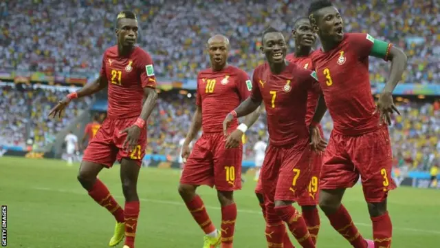 Ghana"s forward and captain Asamoah Gyan celebrates