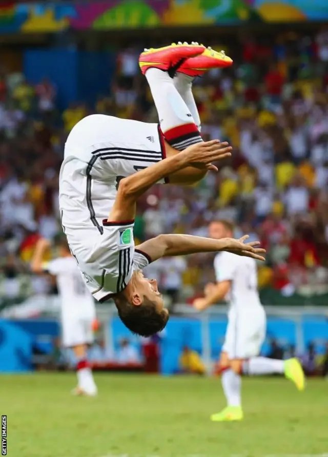 Miroslav Klose of Germany does a flip in celebration