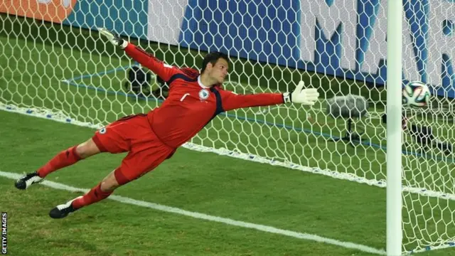 Bosnia-Hercegovina's goalkeeper Asmir Begovic jumps for the ball