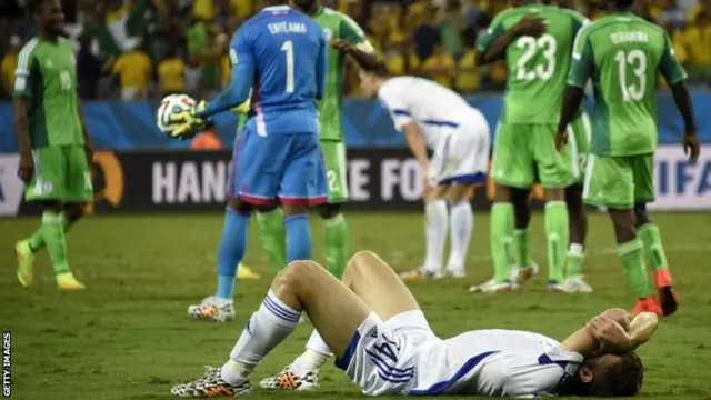 Bosnia-Hercegovina's midfielder Tino Susic reacts on the floor