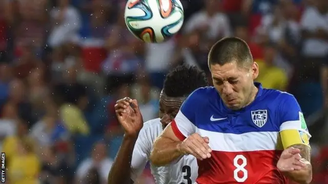 Clint Dempsey heads the ball for the USA