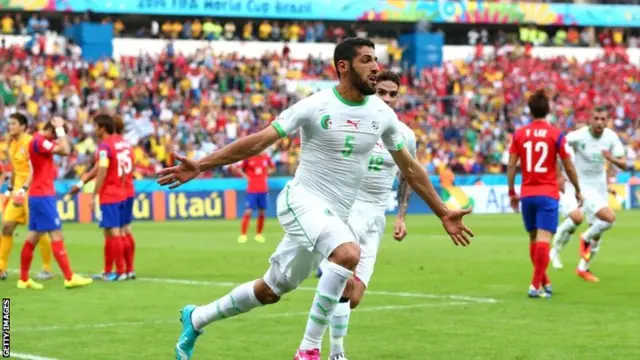 Rafik Halliche of Algeria celebrates scoring his team's second goal