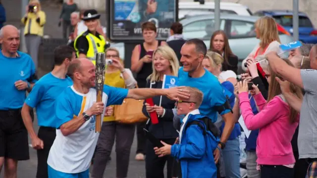 Baton bearer in Cumbernauld Road