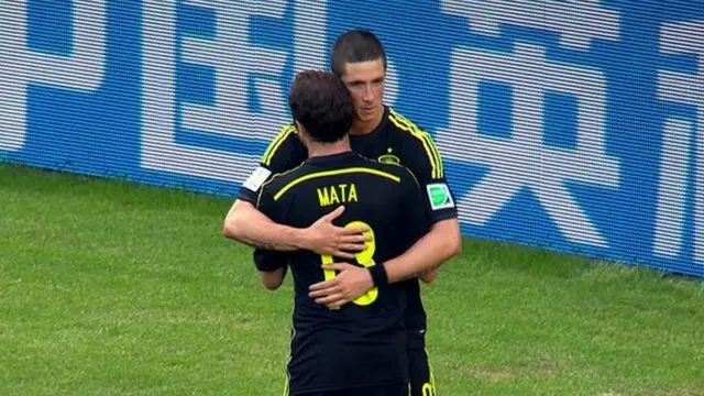 Fernando Torres hugs Juan Mata