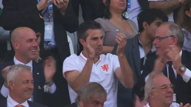 Robin van Persie applauds