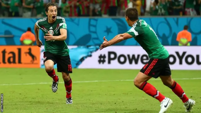 Andres Guardado celebrates after scoring Mexico's second goal