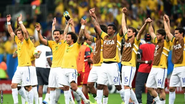 The Brazil team celebrate