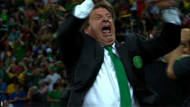 Mexico manager Miguel Herrera celebrates after leading his side in to the knock-out stages of the 2014 Fifa World Cup